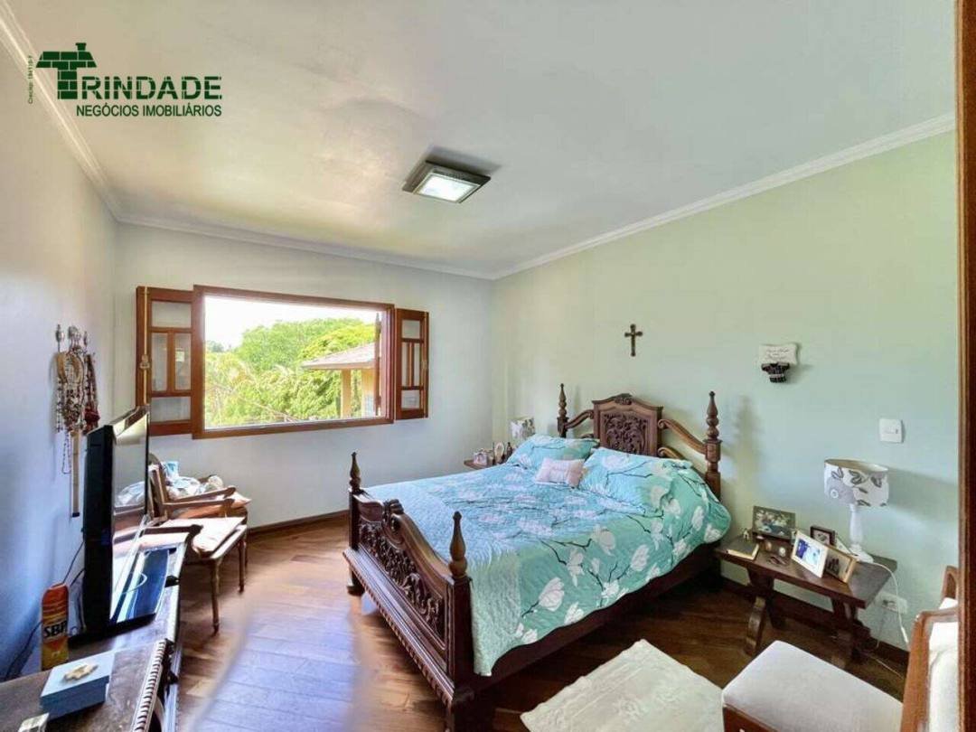 Casa com 4 dormitórios à venda, 336 m² por R$ 1.500.000,00 - Granja Viana - Carapicuíba/SP — foto 27 de 51